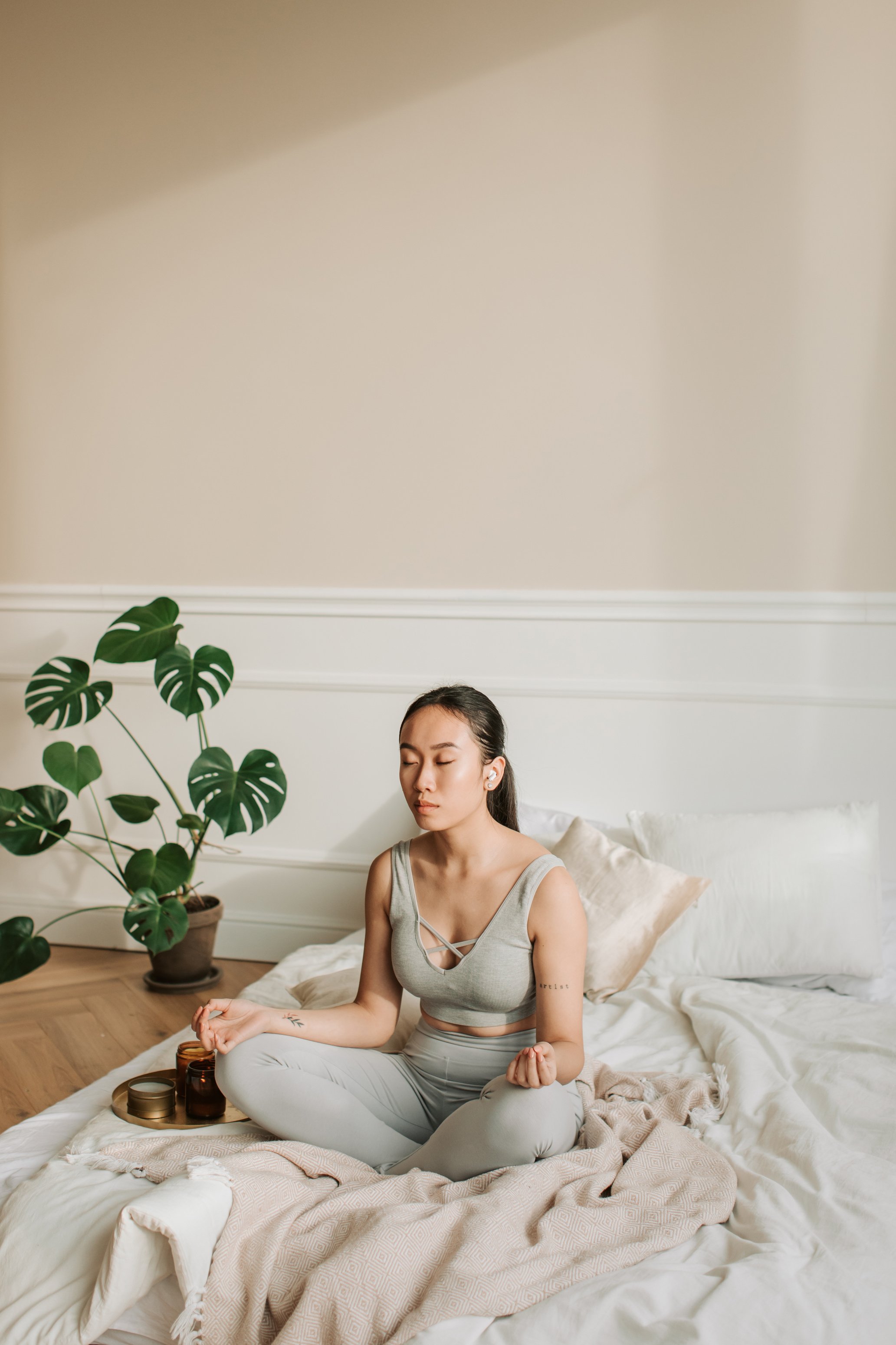 Woman Meditating at Home